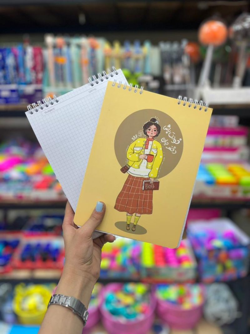 Wire checkered notebook from above خرید و قیمت دفتر شطرنجی