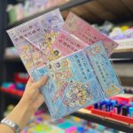Abrangi notebook with sticker